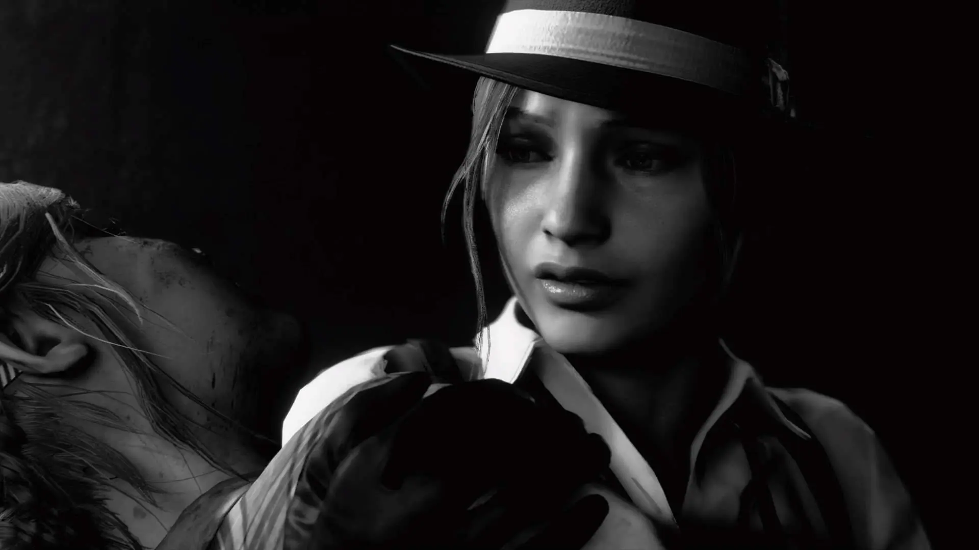 Claire holds Sherry in her arms