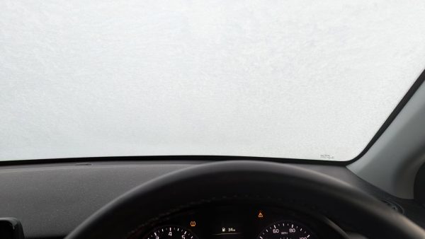 Car windscreen from the inside all frosted over. 