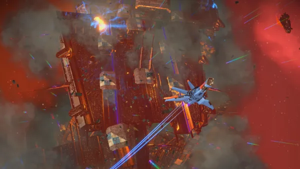 In deep space, a space fighter space ship flies away from a colossal-sized freighter. The freighter is burning, falling downwards and blowing apart.